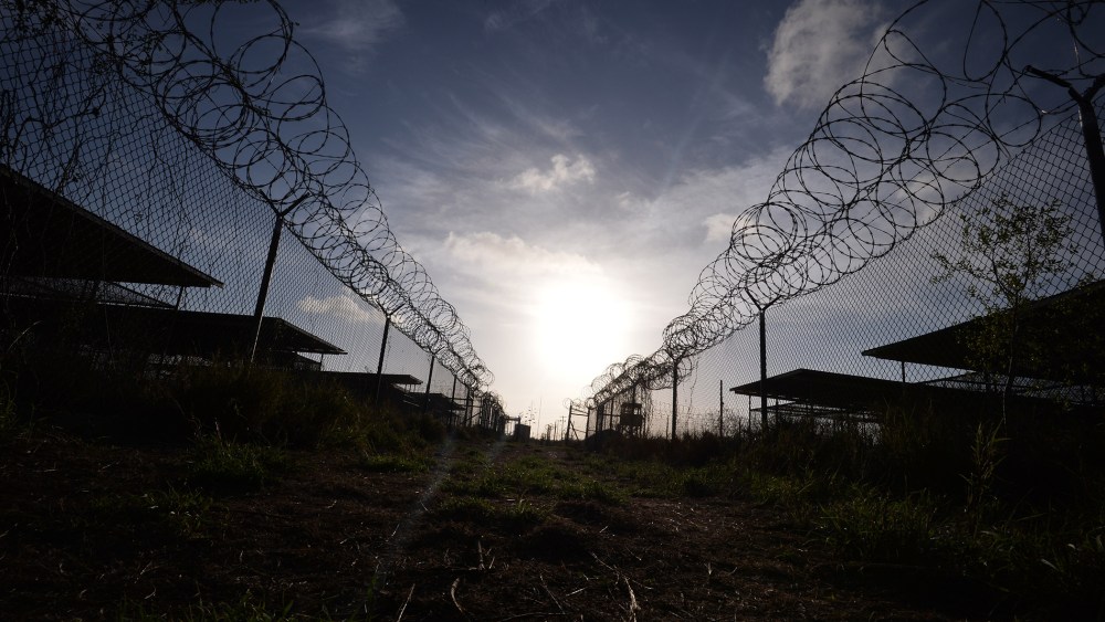 This photo made during an escorted visit and reviewed by the US military, shows the razor wire-topped fence at the abandoned "Camp X-Ray" detention facility at the US Naval Station in Guantanamo Bay, Cuba April 9, 2014. (Photo by Mladen Antonov/AFP/Getty)