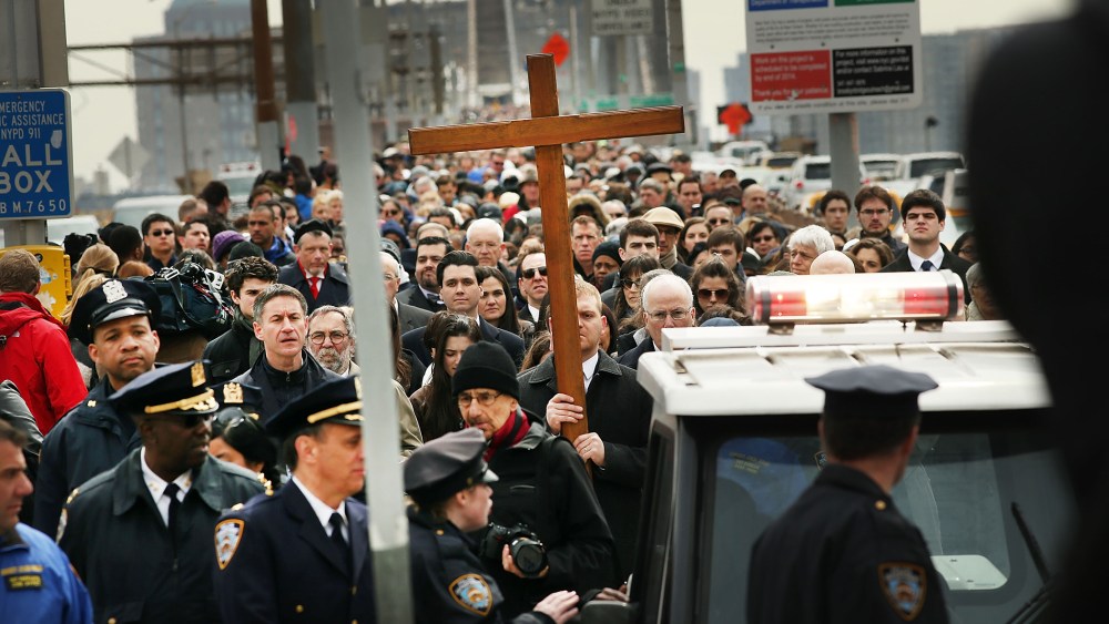 Cardinal Dolan Takes Part In Way Of The Cross Procession Across The Brooklyn Bridge