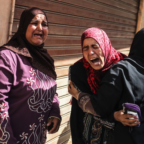 Egyptian defendants' relatives mourn after a judge sentenced 683 alleged Morsi backers to death in the latest mass trial in the southern city of Minya, Egypt, April 28, 2014.