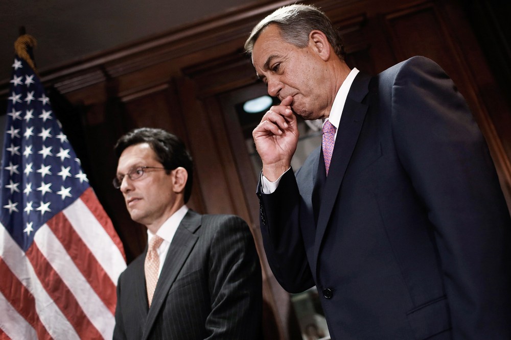 John Boehner and Eric Cantor answer questions during a press conference April 28, 2014 in Washington, DC.