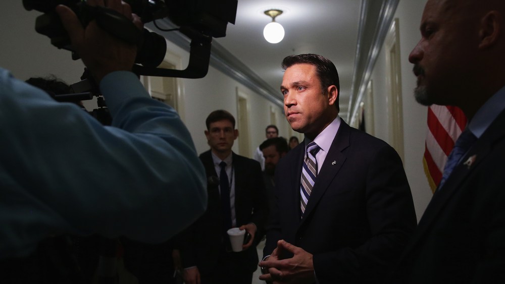 Rep. Michael Grimm (R-NY) speaks to members of the media outside his office April 29, 2014 on Capitol Hill in Washington, DC.