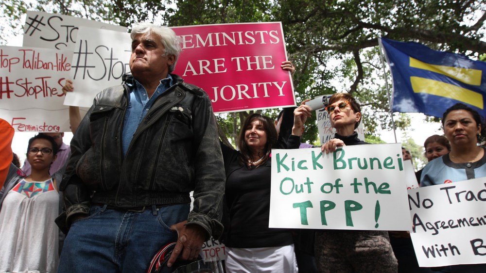 Comedian Jay Leno participates in a rally to protest punishment of women and gay people announced by the Sultan of Brunei outside the Beverly Hills Hotel, which is owned by the Sultan, on May 5, 2014 in Beverly Hills, Calif.