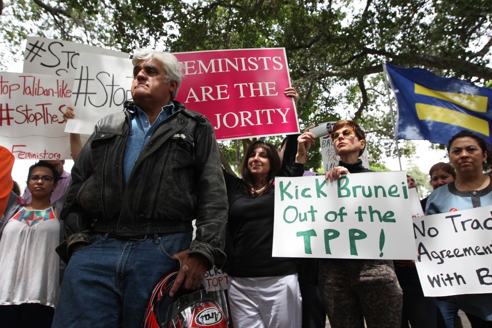 Comedian Jay Leno participates in a rally to protest punishment of women and gay people announced by the Sultan of Brunei outside the Beverly Hills Hotel, which is owned by the Sultan, on May 5, 2014 in Beverly Hills, Calif.