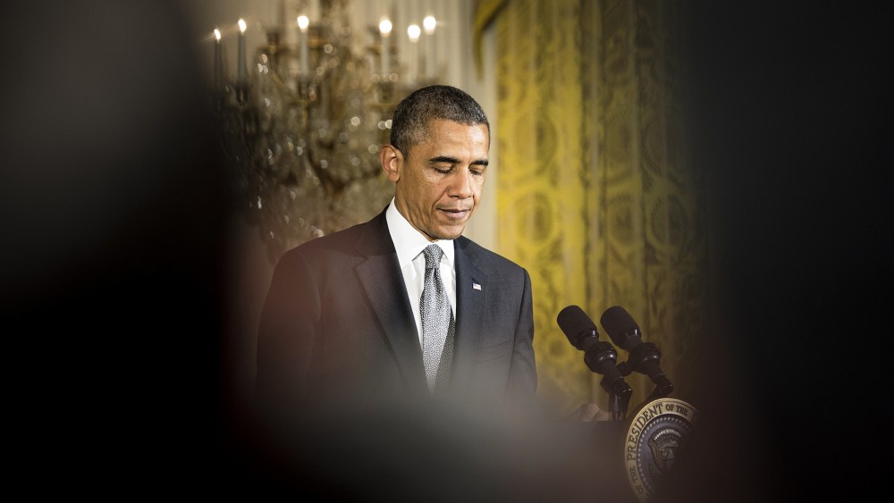 President Barack Obama pauses while speaking during an event in the East Room of the White House on May 5, 2014 in Washington, D.C.