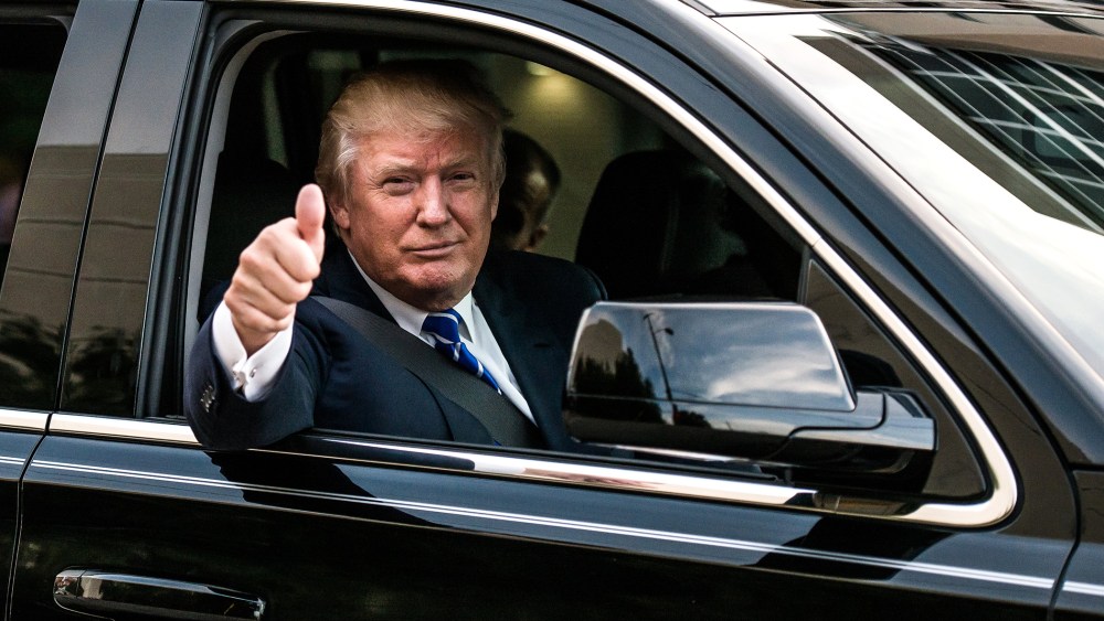 Republican presidential candidate Donald Trump leaves a campaign event on Sept. 23, 2015 in Columbia, S.C. (Photo by Sean Rayford/Getty)