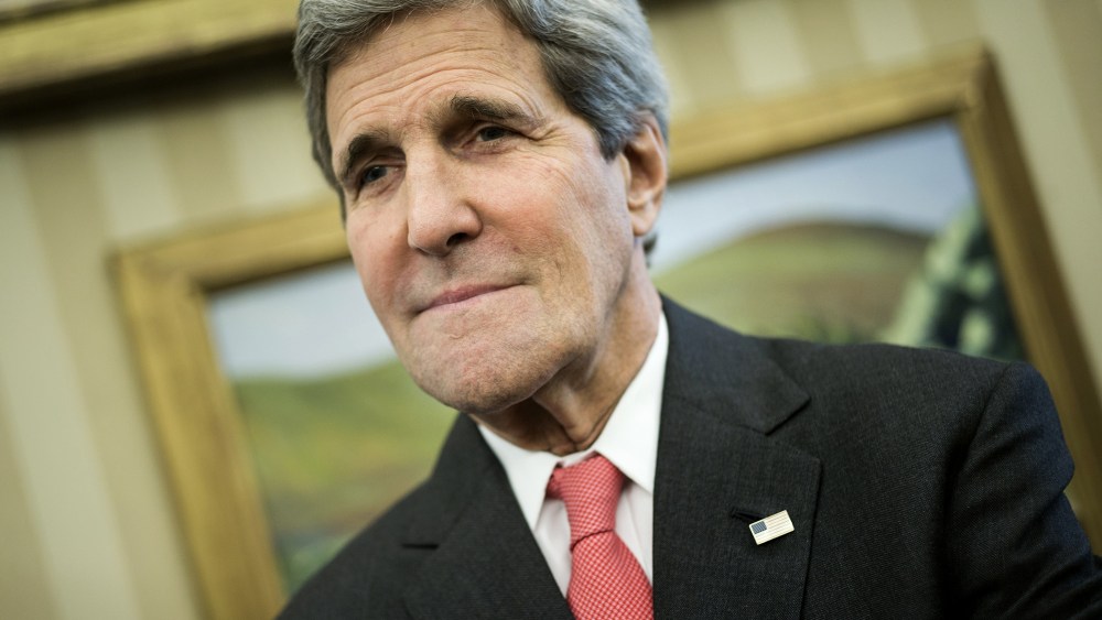 US Secretary of State John Kerry waits for a meeting in the Oval Office of the White House on May 12, 2014 in Washington, DC.