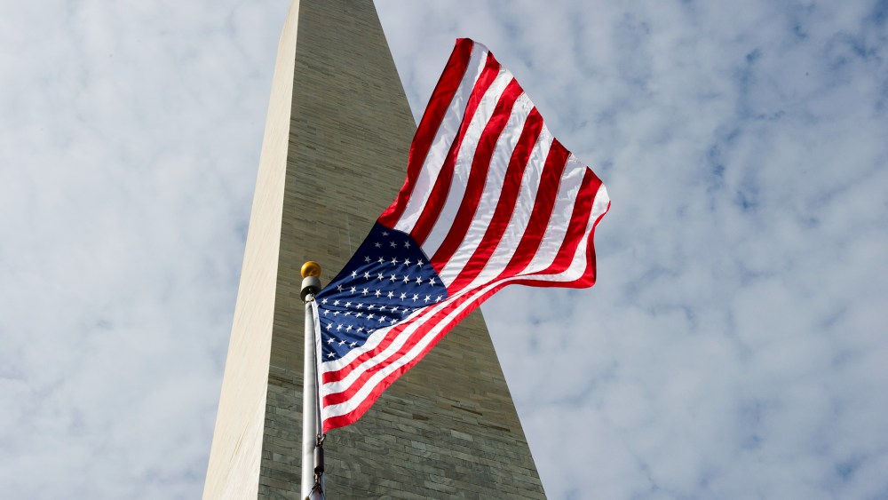 The Washington Monument is seen behind the US flag May 12, 2014 in Washington, DC.