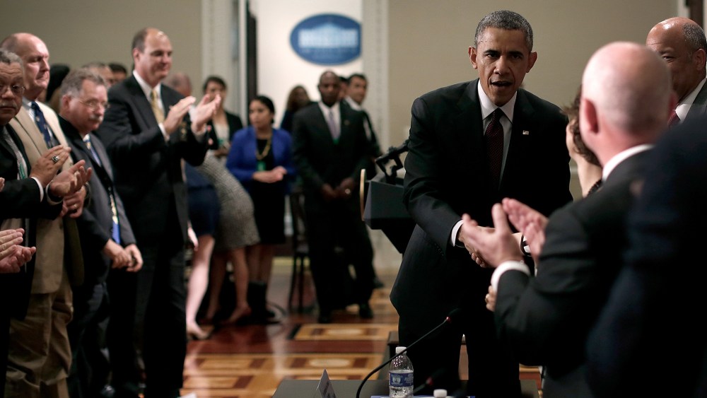 U.S. President Barack Obama greets law enforcement leaders from across the country after speaking to them in the Eisenhower Executive Office Building on May 13, 2014 in Washington, DC.