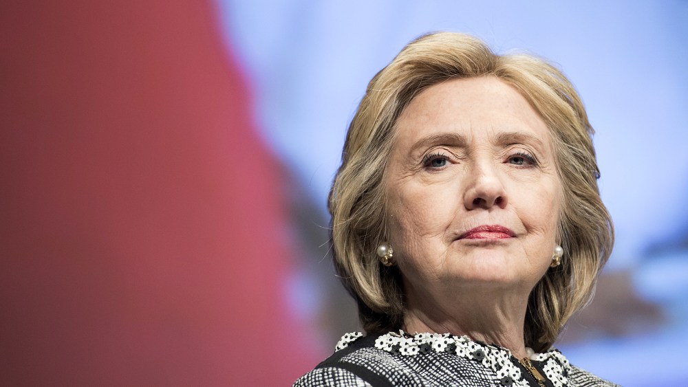 Former Secretary of State Hillary Clinton waits to speak at the World Bank on May 14, 2014 in Washington, D.C. (Photo by Brendan Smialowski/AFP/Getty)