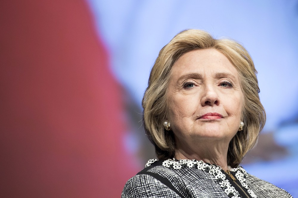 Former Secretary of State Hillary Clinton waits to speak at the World Bank on May 14, 2014 in Washington, D.C. (Photo by Brendan Smialowski/AFP/Getty)