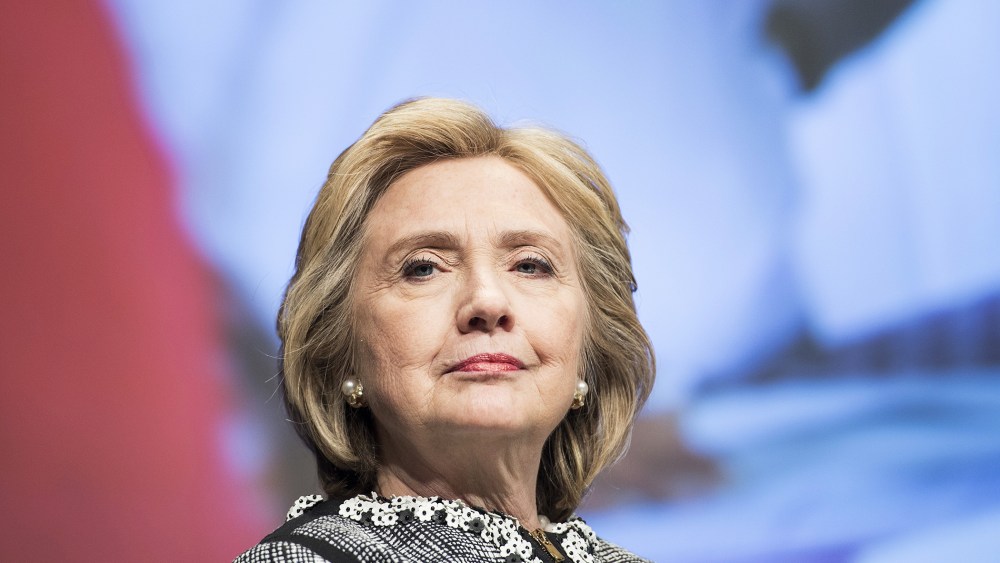 Former Secretary of State Hillary Clinton waits to speak at the World Bank May 14, 2014 in Washington, D.C.