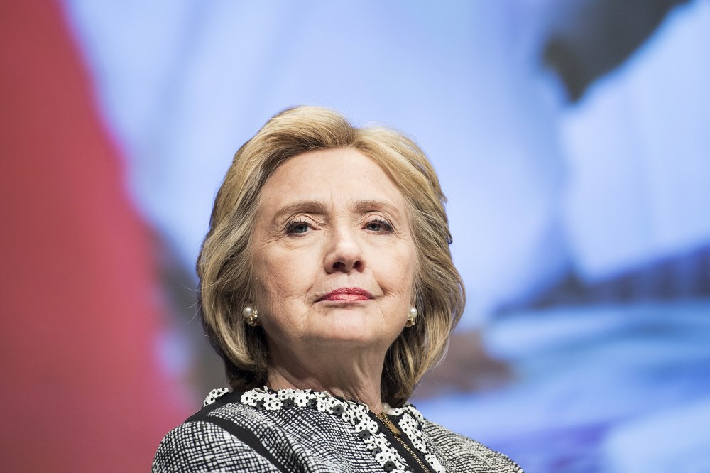 Former Secretary of State Hillary Clinton waits to speak at the World Bank May 14, 2014 in Washington, D.C.