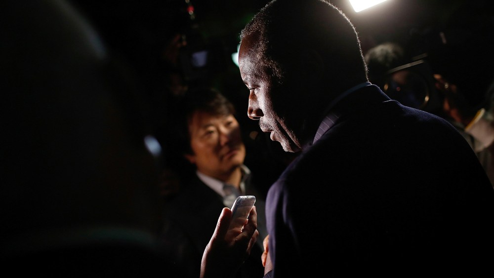 Republican presidential candidate Dr. Ben Carson answers questions from members of the press after delivering brief remarks to supporters on Oct. 16, 2015 in Alexandria, Va. (Photo by Win McNamee/Getty)