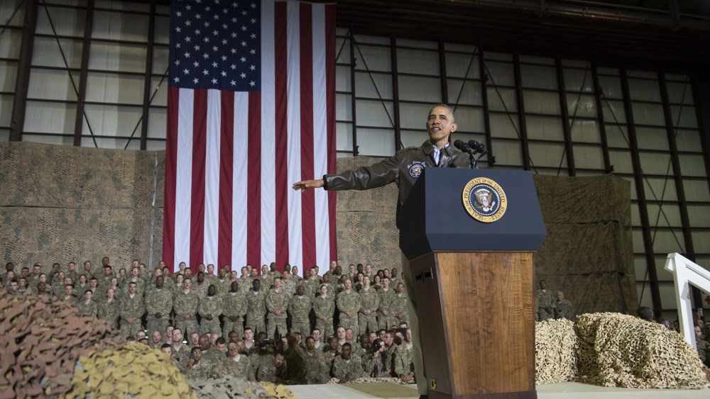 President Barack Obama speaks during a surprise visit with US troops at Bagram Air Field, north of Kabul, in Afghanistan, May 25, 2014, prior to the Memorial Day holiday.