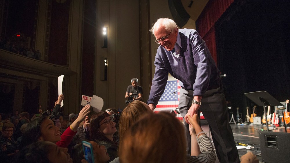 Democratic presidential candidate Senator Bernie Sanders (I-VT) greets guests at an event he was hosting to raise support for his campaign at the Adler Theater on Oct. 23, 2015 in Davenport, Iowa. (Photo by Scott Olson/Getty)