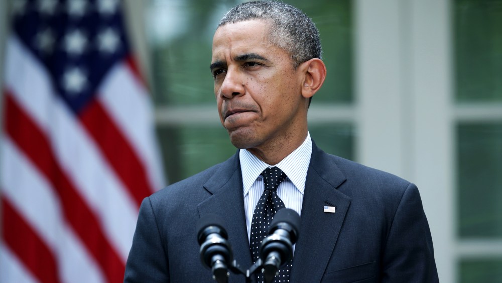 President Barack Obama pauses as he makes a statement in the Rose Garden of the White House on May 27, 2014 in Washington, DC.