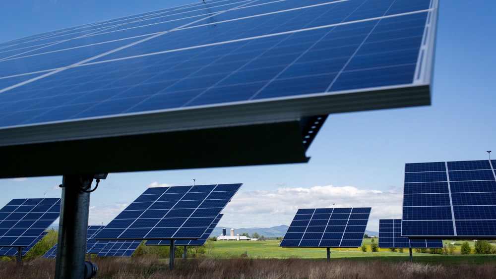 Solar tracker panels follow the sun's path May 17, 2014 on a Champlain Valley dairy farm near West Haven, Vermont.