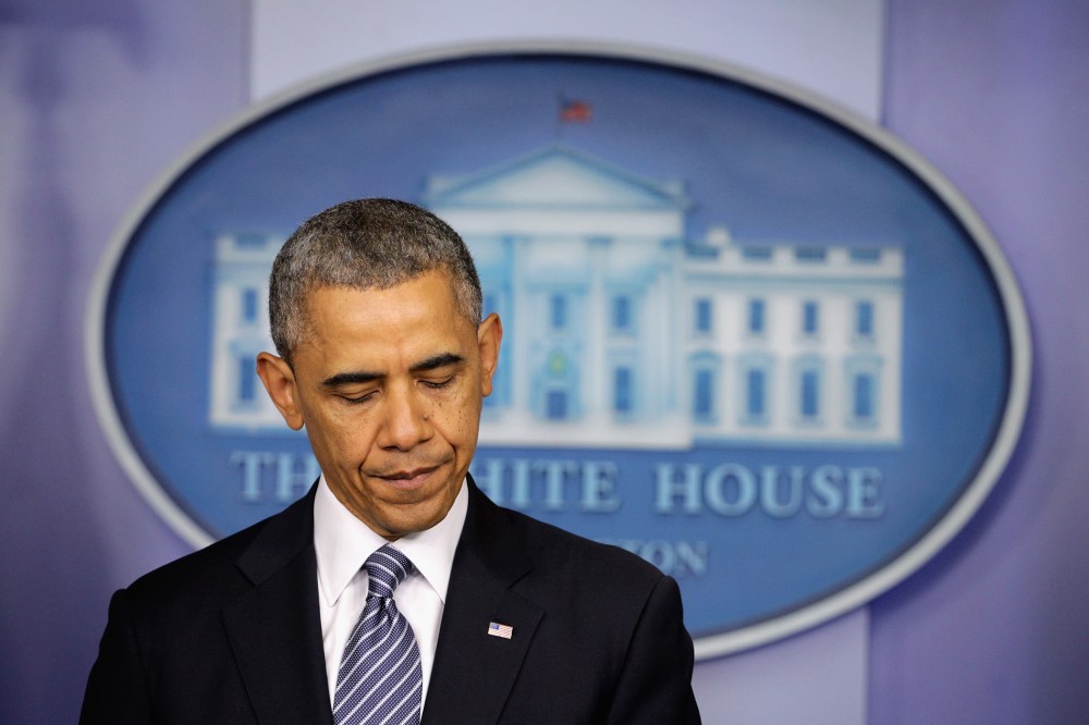 U.S. President Barack Obama pauses as he announces the resignation of Eric Shinseki in the briefing room of the White House May 30, 2014.
