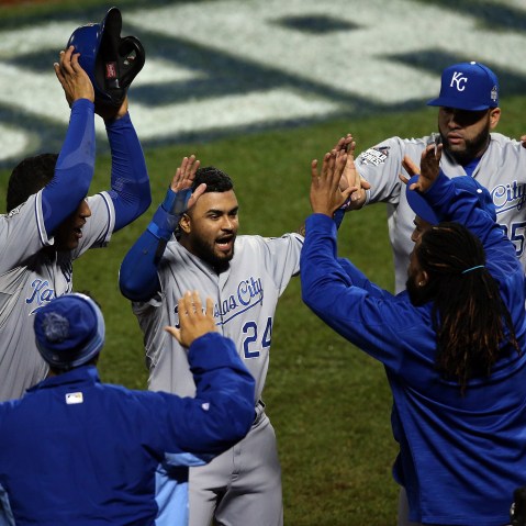 Christian Colon #24 of the Kansas City Royals celebrates after scoring in the 12th inning against the New York Mets during Game Five of the 2015 World Series at Citi Field on Nov. 1, 2015 in New York, N.Y. (Photo by Doug Pensinger/Getty)