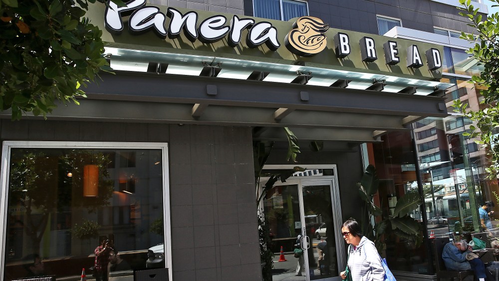 A pedestrian walks by a Panera Bread restaurant on June 3, 2014 in San Francisco, California.