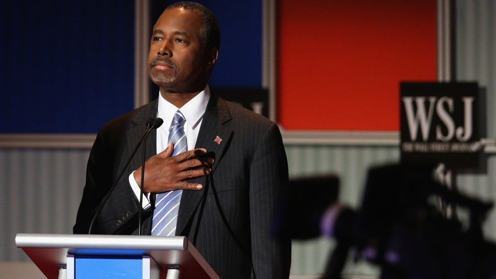 Presidential candidate Ben Carson pauses during the Star Spangled Banner in the opening of the Republican Presidential Debate at the Milwaukee Theatre Nov. 10, 2015 in Milwaukee, Wis. (Photo by Scott Olson/Getty)