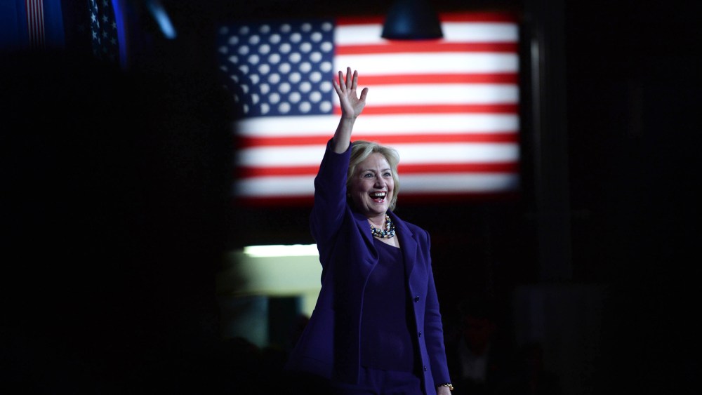 Democratic Presidential candidate Hillary Clinton takes the stage at the Jefferson Jackson Dinner at the Radisson Hotel on Nov. 29, 2015 in Manchester, N.H. (Photo by Darren McCollester/Getty)