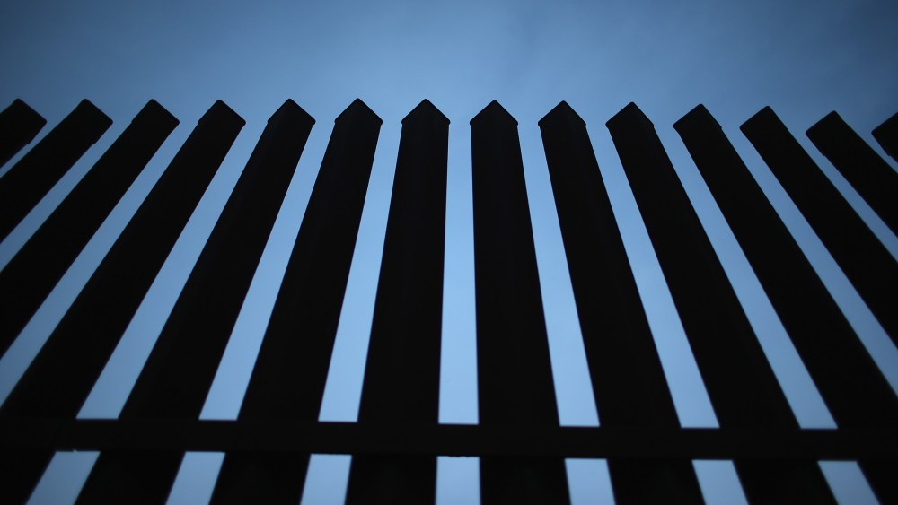 The U.S.-Mexico border fence stands on Dec. 8, 2015 near McAllen, Texas. (Photo by John Moore/Getty)
