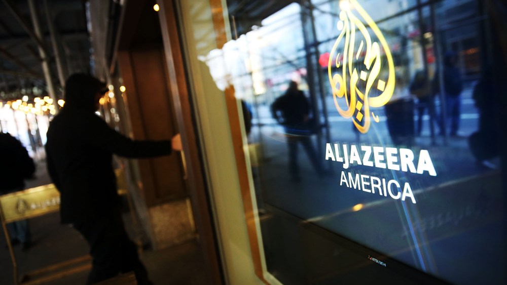 The logo for Al Jazeera America is displayed outside the cable news channel's offices on Jan. 13, 2016 in New York City. (Photo by Spencer Platt/Getty)