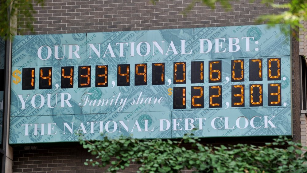 The National Debt Clock, a billboard-size digital display showing the increasing US debt, on Sixth Avenue August 1, 2011 in New York.