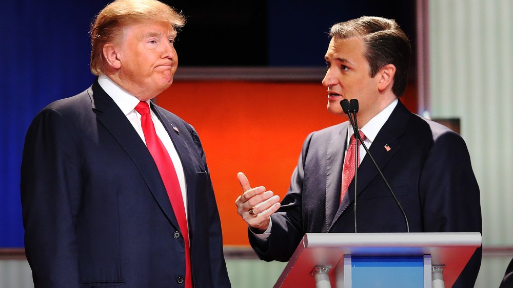 Republican presidential candidates Donald Trump and Sen. Ted Cruz (R-TX) speak during a commercial break in the sixth Republican presidential debate in North Charleston, S.C., on Jan. 14, 2016. (Photo by Scott Olson/Getty)