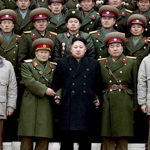 File Photo: This picture taken by North Korea's official Korean Central News Agency (KCNA) on January 1, 2012 shows new North Korean leader Kim Jong-Un (front row-C) posing for photos with soldiers of the Seoul Ryu Kyong Su 105 Guards Tank Division of...