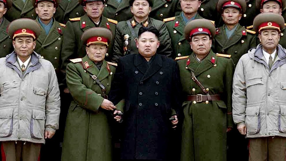 File Photo: This picture taken by North Korea's official Korean Central News Agency (KCNA) on January 1, 2012 shows new North Korean leader Kim Jong-Un (front row-C) posing for photos with soldiers of the Seoul Ryu Kyong Su 105 Guards Tank Division of...