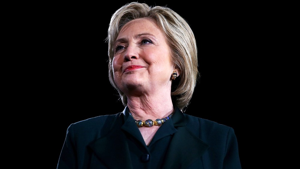 Democratic presidential candidate former Secretary of State Hillary Clinton looks on during a "Get Out The Caucus" at the Clark County Government Center on Feb. 19, 2016 in Las Vegas, Nev. (Photo by Justin Sullivan/Getty)