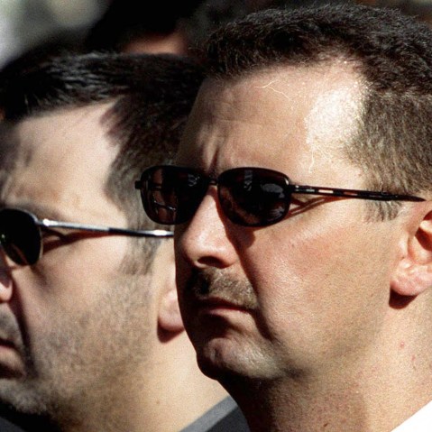 DAMASCUS, SYRIA:  The sons of Syria's late President Hafez al-Assad, Maher (L) and heir apparent, Bashar (R), march behind their father's coffin during his funeral in Damascus 13 June 2000. Assad, who ruled his country with an iron fist for 30 years,...