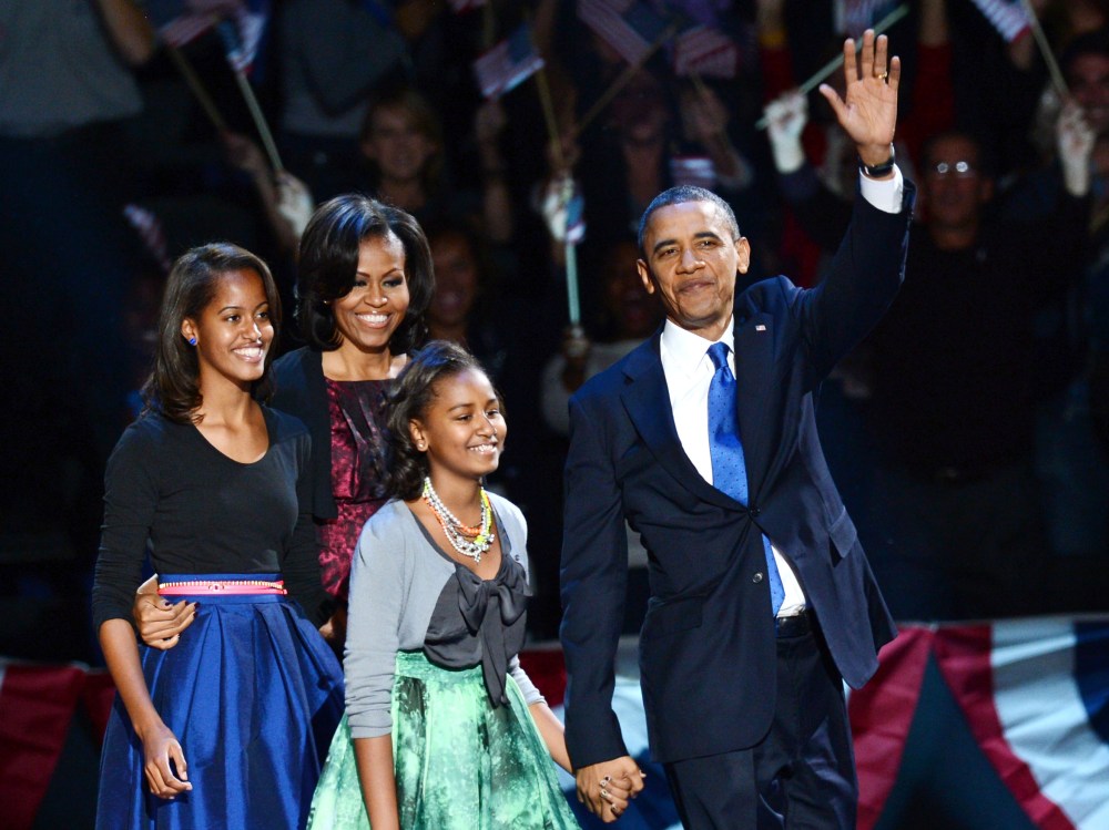 U.S. President Barack Obama and family arrive on stage after winning the 2012 US presidential election November 7, 2012 in Chicago, Illinois. Obama swept to re-election, forging history again by defying the dragging economic recovery and high...