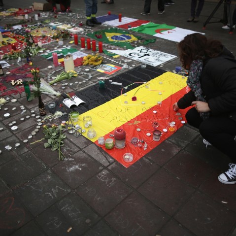 Flowers and tributes, to the victims and injured, continue to adorn the Place de la Bourse following yesterday's terrorists attacks on March 23, 2016 in Brussels, Belgium. (Photo by Christopher Furlong/Getty)