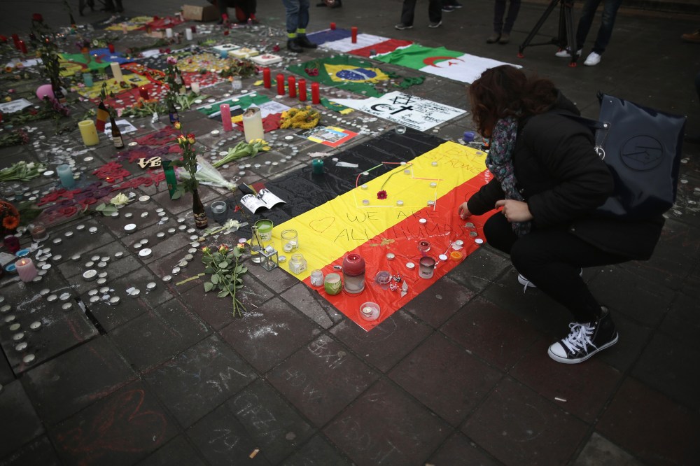 Flowers and tributes, to the victims and injured, continue to adorn the Place de la Bourse following yesterday's terrorists attacks on March 23, 2016 in Brussels, Belgium. (Photo by Christopher Furlong/Getty)