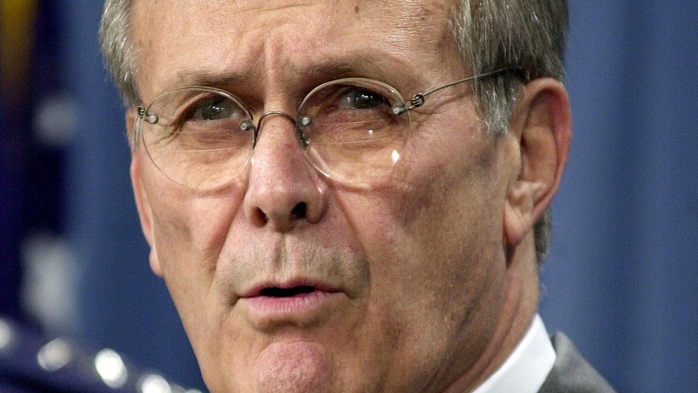 File Photo: US Secretary of Defense Donald Rumsfeld briefs the press at the Pentagon in 2001. (Photo by Shawn Thew/AFP/Getty Images, File)