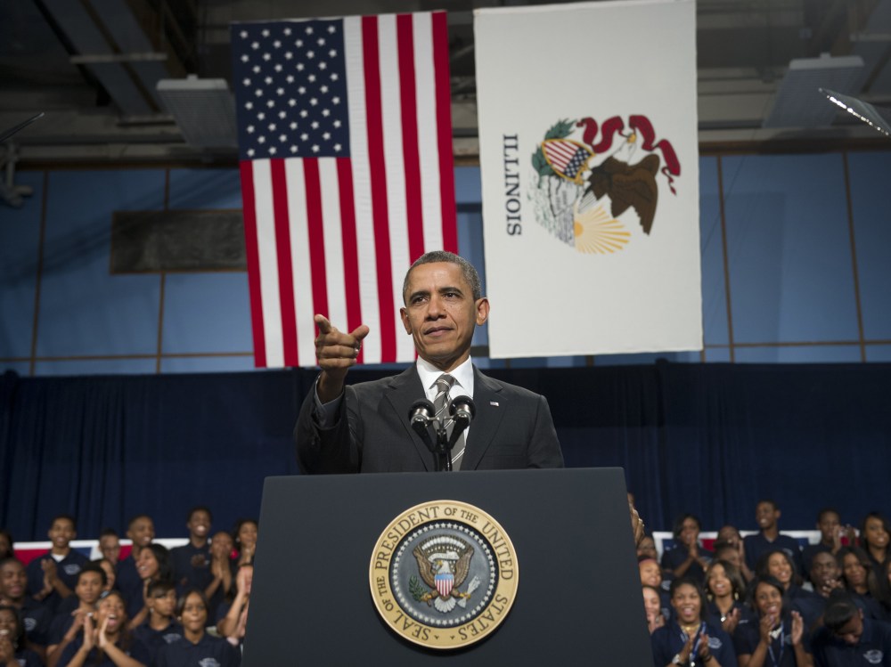 US President Barack Obama speaks about gun violence as well as the economy at Hyde Park Academy in Chicago on February 15, 2013.  (Photo by Saul Loeb/AFP/Getty Images)
