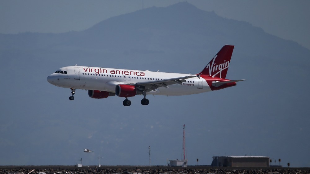A Virgin America plane lands at San Francisco International Airport on March 29, 2016 in Burlingame, Calif. (Photo by Justin Sullivan/Getty)