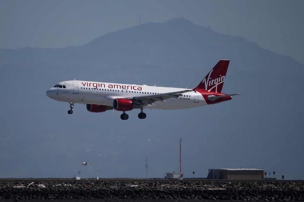 A Virgin America plane lands at San Francisco International Airport on March 29, 2016 in Burlingame, Calif. (Photo by Justin Sullivan/Getty)