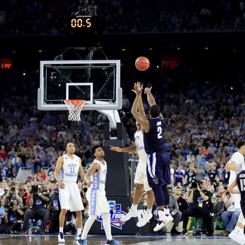 Kris Jenkins #2 of the Villanova Wildcats shoots the game-winning three pointer to defeat the North Carolina Tar Heels 77-74 in the 2016 NCAA Men's Final Four National Championship game on April 4, 2016 in Houston, Texas. (Photo by Ronald Martinez/Getty)