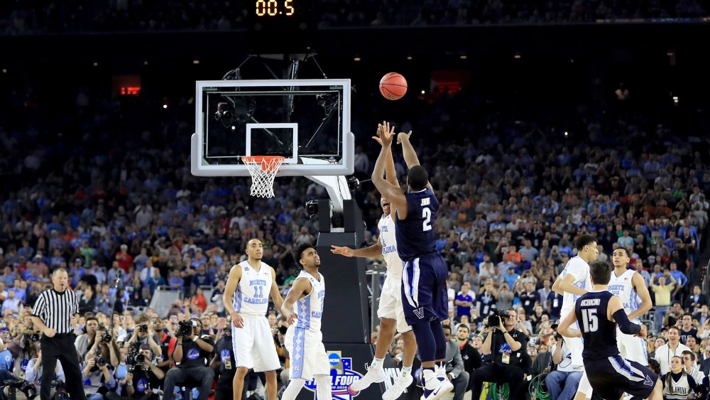 Kris Jenkins #2 of the Villanova Wildcats shoots the game-winning three pointer to defeat the North Carolina Tar Heels 77-74 in the 2016 NCAA Men's Final Four National Championship game on April 4, 2016 in Houston, Texas. (Photo by Ronald Martinez/Getty)