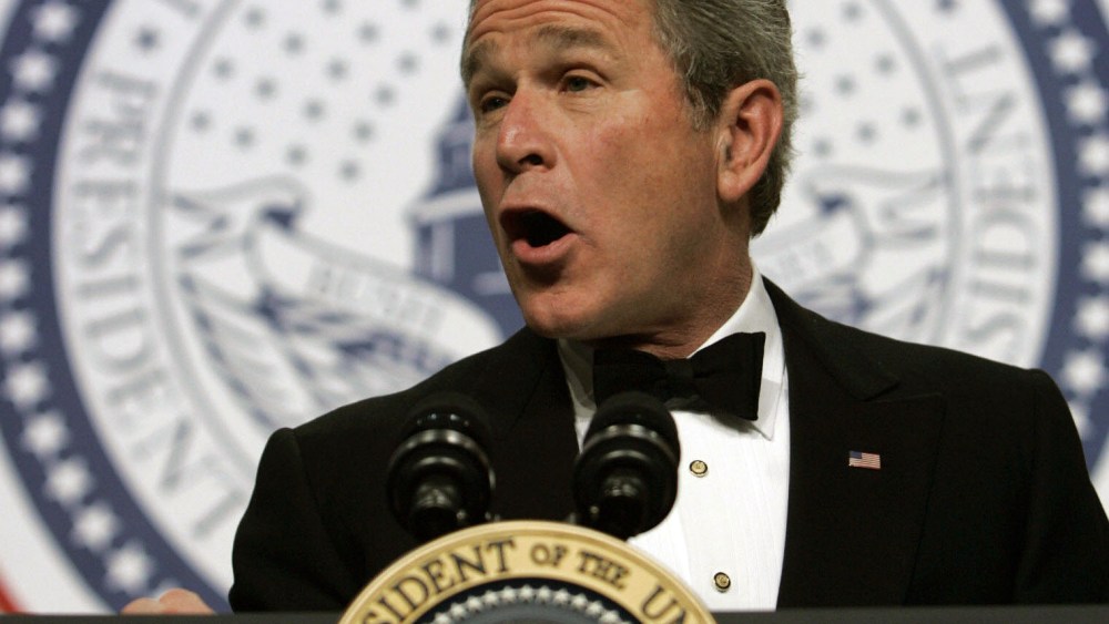 File Photo: US President George W. Bush addresses the Texas Wyoming Ball, part of the festivities marking his inauguration for a second term, in Washington 20 January 2005.  (Photo by Brendan Smialowski/AFP/Getty Images, File)