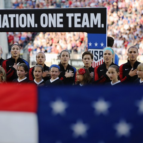 The United States Women's National Soccer Team observe the national anthem as they prepare to face Japan during an international friendly match at Dick's Sporting Goods Park on June 2, 2016 in Commerce City, Colo. (Photo by Doug Pensinger/Getty)