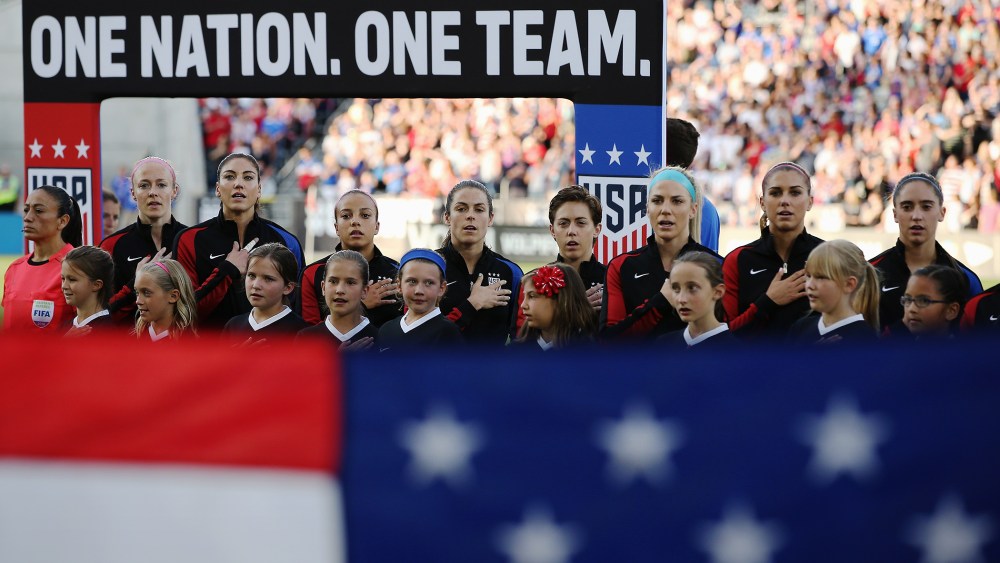 The United States Women's National Soccer Team observe the national anthem as they prepare to face Japan during an international friendly match at Dick's Sporting Goods Park on June 2, 2016 in Commerce City, Colo. (Photo by Doug Pensinger/Getty)