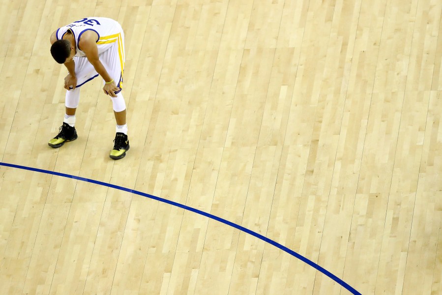 Stephen Curry #30 of the Golden State Warriors reacts to a play in Game 7 of the 2016 NBA Finals against the Cleveland Cavaliers at ORACLE Arena on June 19, 2016 in Oakland, Calif. (Photo by Ezra Shaw/Getty)