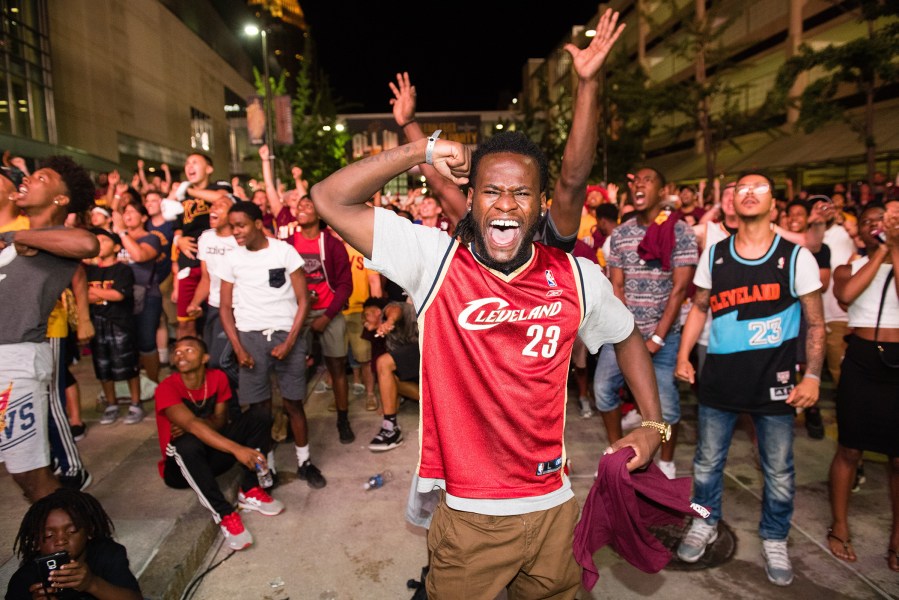 Fans react to a play during the Cleveland Cavaliers NBA Finals Game Seven watch party at Quicken Loans Arena on June 19, 2016 in Cleveland, Ohio. (Photo by Jason Miller/Getty)