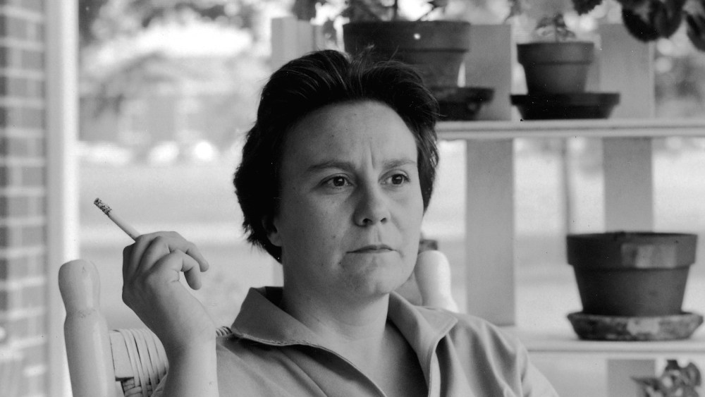 Portrait of American novelist Harper Lee smokes a cigarette as she sits on the porch of her parents home, Monroeville, Alabama, May 1961. (Photo by Donald Uhrbrock/The LIFE Images Collection/Getty)