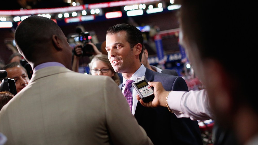 Donald Trump Jr. is interviewed by the media prior to the start of the second day of the Republican National Convention on July 19, 2016 at the Quicken Loans Arena in Cleveland, Ohio. (Photo by Win McNamee/Getty)
